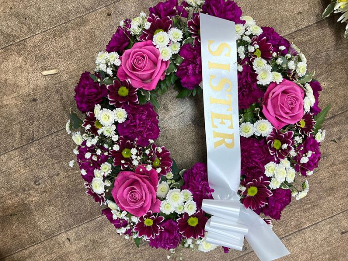 round funeral wreath - sister