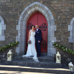 Church Entrance with Lanterns and Ivy Railings