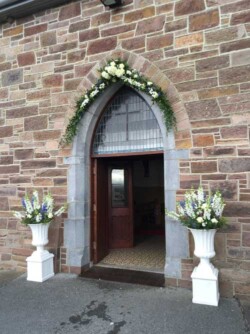 keel church entrance with arch and urns
