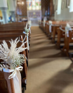 Gyp pew ends with dried flowers
