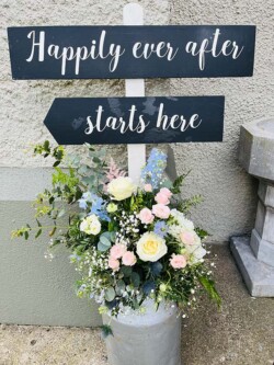 Flowers and wedding sign