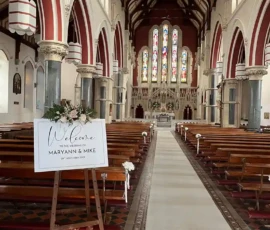 church entrance floral welcome sign